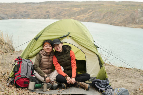 istock Happy Asian Girlfriends In Camp 1405302120