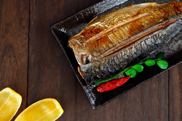 istock Grilled fish dish mackerel on the table 1405304038