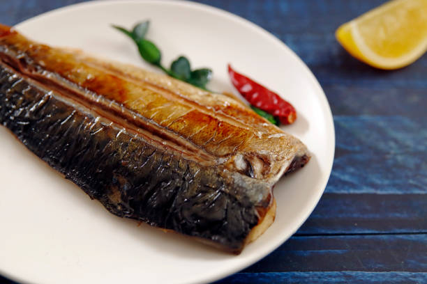 istock Grilled fish dish mackerel on the table 1405304128