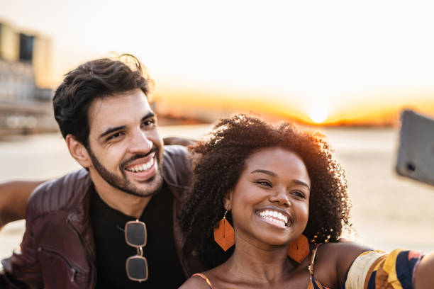 istock Friends taking a selfie at sunset on the bay 1405307154