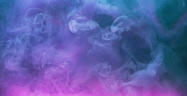 istock smoke flow magic poison blue pink paint mix 1405308273
