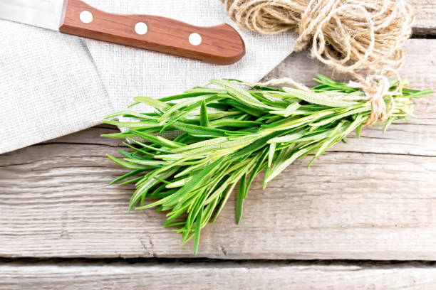 istock Rosemary fresh on old board top 1405313611