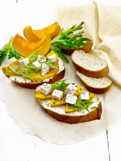 istock Bruschetta with pumpkin and ricotta on board 1405317440