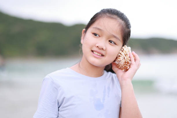 Little boy on the beach during summer vacation