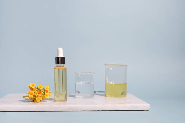 istock aromatherapy oil on blue background. 1405322391