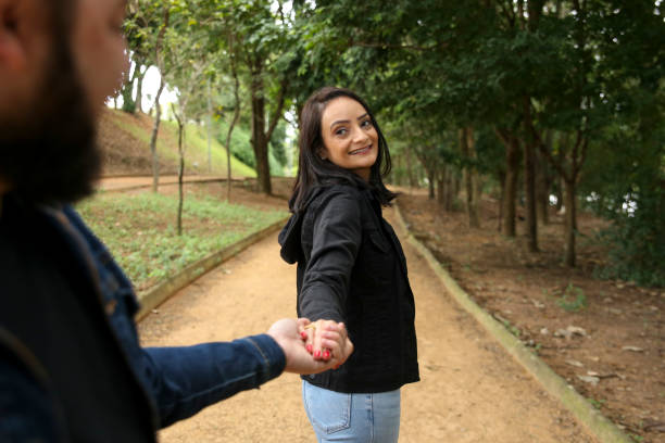 istock Couple Walking in the Park. 1405325557