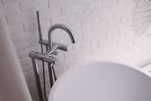 istock hydrant shower with bathtub in bathroom 1405326610