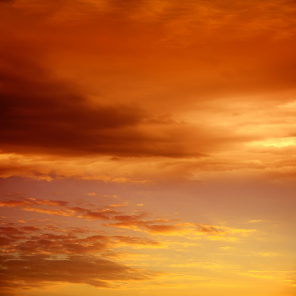 Empty sunset sky with clouds for backgrounds