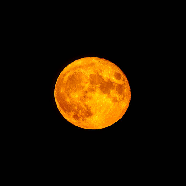 Red full moon in red color also called bloodmoon Bright orange and red fool moon over the sea. Red full moon in red color also called bloodmoon fool moon stock pictures, royalty-free photos & images