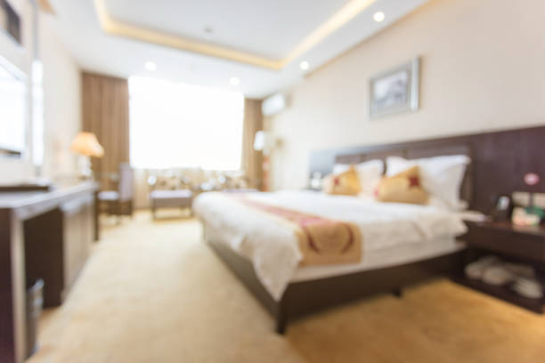 istock Defocused effect of hotel room interior background 1405339057