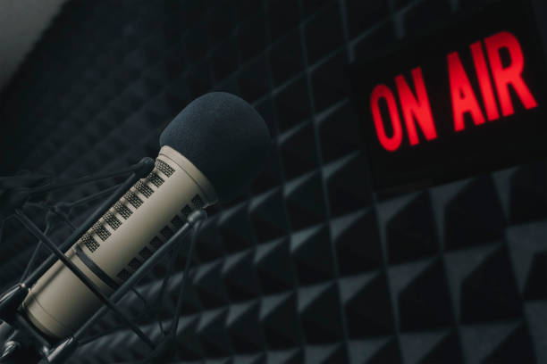 istock Professional microphone and on air sign 1405346158