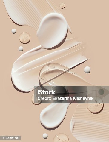 istock cosmetic smears of creamy texture on a pastel beige background 1405351781