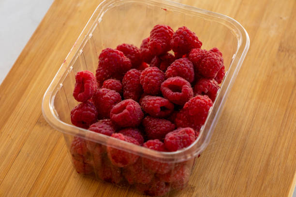 istock Close up fresh raspberries on the table 1405354258