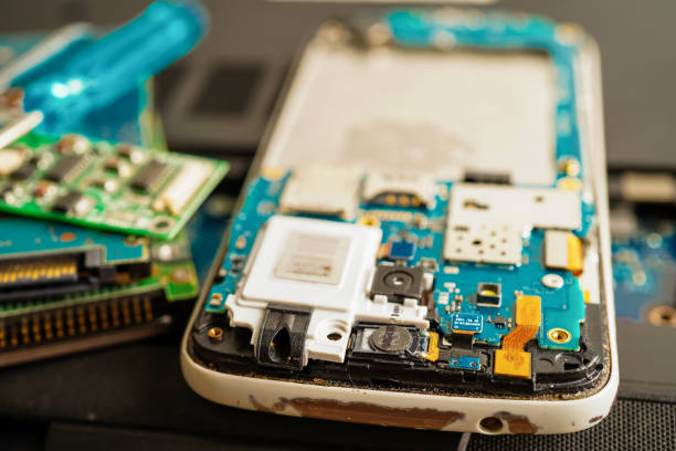 istock Repairing and upgrade mobile phone, electronic, computer hardware and technology concept. 1405358937
