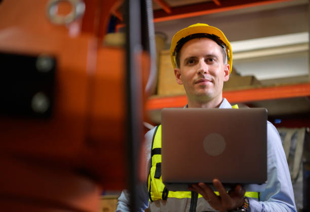 istock A male engineer checking the operation of a welding robot. used for precision welding control Fast and highly secure 1405359466