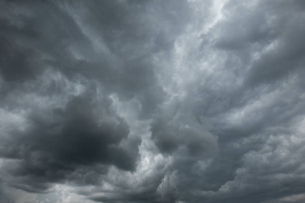 istock A dramatic dark storm cloudy sky or cloudscape.  Wide-angle view, gray clouds, no people 1405364117