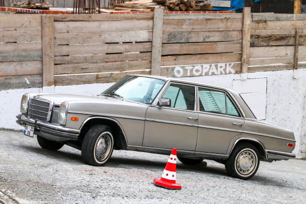 Istanbul, Turkey - February 11, 2021: Classic saloon car Mercedes-Benz W114 in the city street.