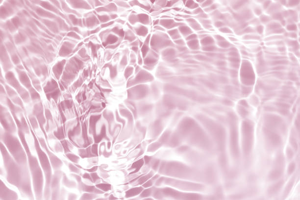 istock pink water wave, natural swirl pattern texture background, abstract summer photography 1405366698