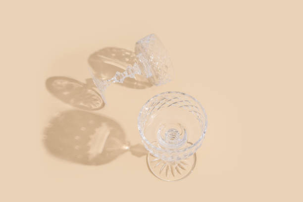 istock Two empty wineglass on the table on a light background. Top view, flat lay 1405368069
