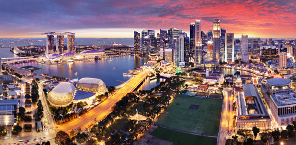 Singapore City, Singapore - February 4, 2023 : Sunrise view of Marina Bay area with the Marina Bay Sands Hotel, Art Science  Museum and Central Business District