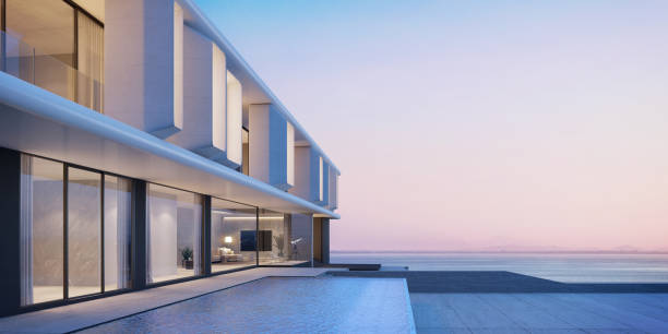 istock Modern architecture with swimming pool and sea view in sunset.3d rendering 1405368441