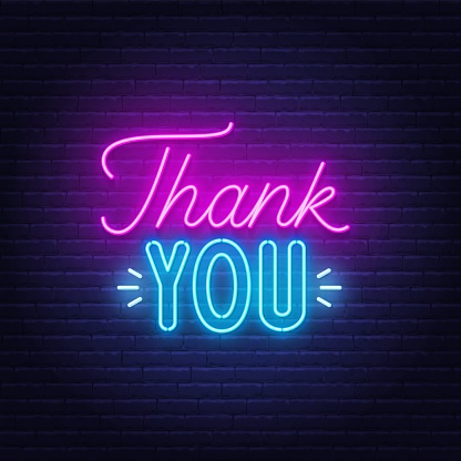 Thank You neon sign on brick wall background .