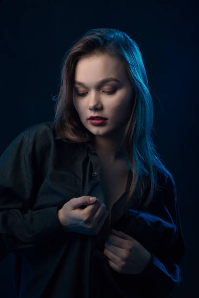 istock sensual woman undressing 1405374958