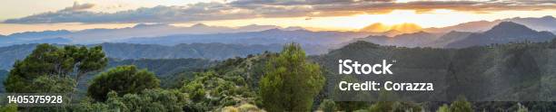 Incredible Landscape Of The Mountains Of Malaga With Sunset In The Cloudy Sky Stock Photo - Download Image Now