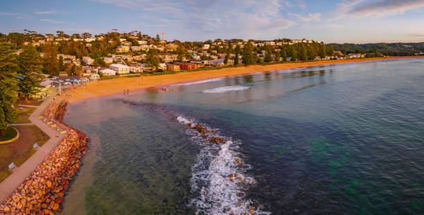 istock Sunrise shorescape at the beach with high cloud 1405375932