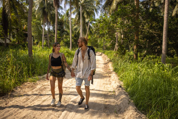 istock Caucasian couple exploring the rainforest 1405376124