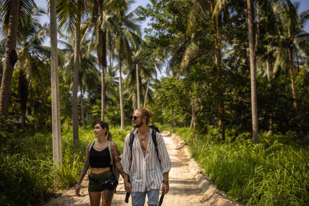 istock Travel couple exploring the rainforest 1405376387