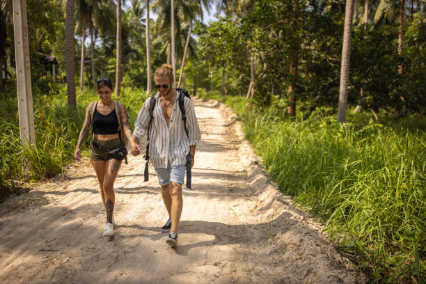 istock Caucasian couple exploring the rainforest 1405377005