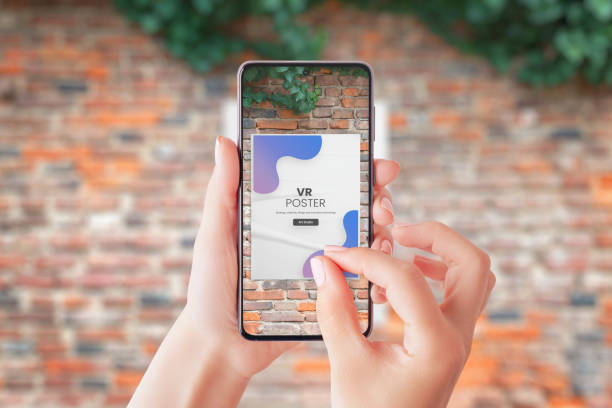 istock Using a mobile phone to watch street advertisements in virtual reality. Augmented reality projection on smart phone display concept 1405377473