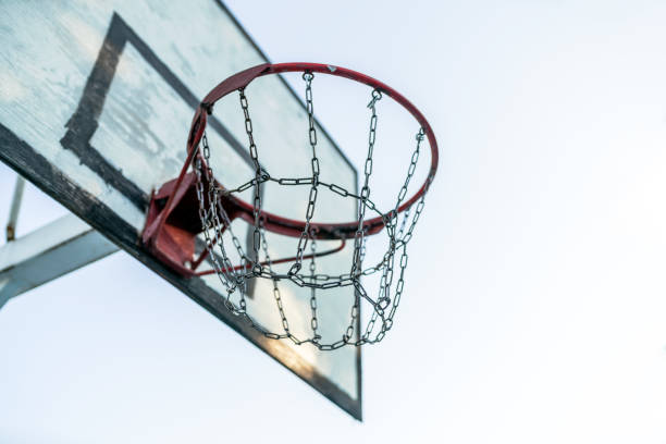 istock Basketball hoop with a metallic chain net 1405377483
