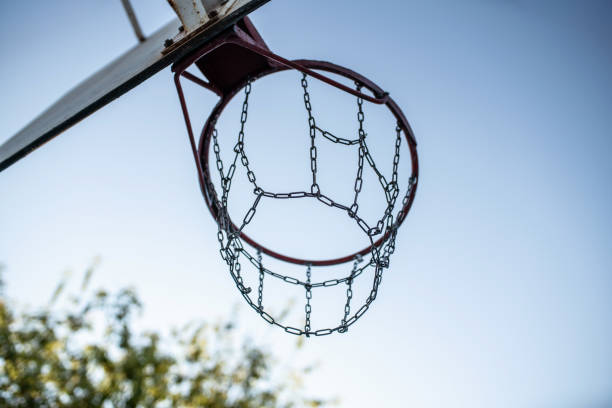 istock Basketball hoop with a metallic chain net 1405378372