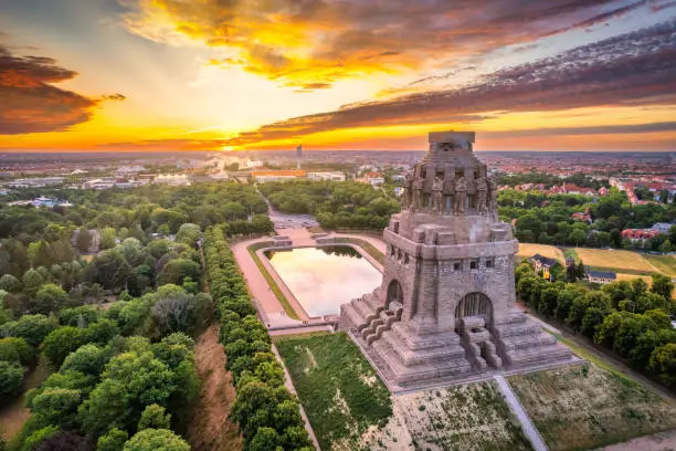 Panoramic view over the city of Leipzig with the Völkerschlachtdenkmal during the sunset, Leipzig, Saxony, Germany