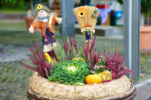 autumnal decoration with the fruits and vegetables of the region. traditional harvest festival. detailed handicraft art.