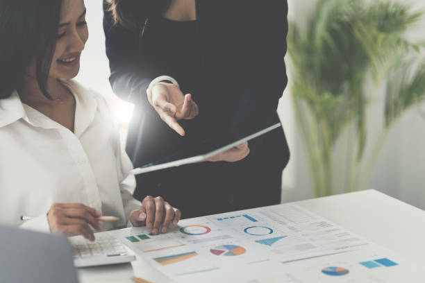 istock Business team hands at working with financial plan, meeting, discussion, brainstrom with tablet on office desk, Meeting concept. 1405381192