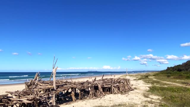 Driftwood Structures Made On Beach