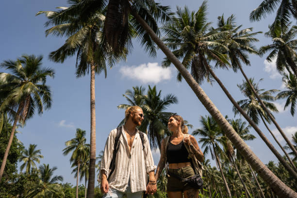 istock Low angle view of couple in the rainforest 1405384903