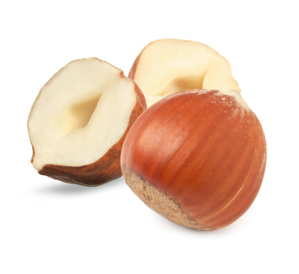 istock Tasty organic hazelnuts on white background. Healthy snack 1405387948