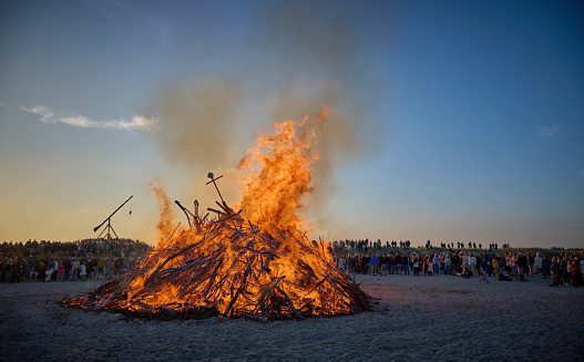 The old characteristic tilting beacon has been lit even though it is only for the day. At midsummer the 23th. of June bonfire is lit on the beach in the evening to celebrate the bright nights and long days in the northern countries. \nPeople gather at \