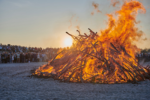 The old characteristic tilting beacon has been lit even though it is only for the day. At midsummer the 23th. of June bonfire is lit on the beach in the evening to celebrate the bright nights and long days in the northern countries. \nPeople gather at \