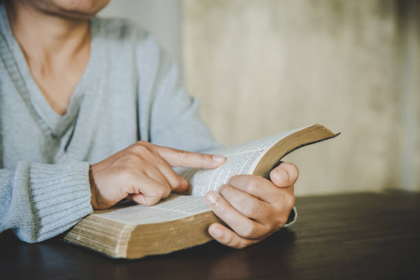 istock woman with bible 1405391723