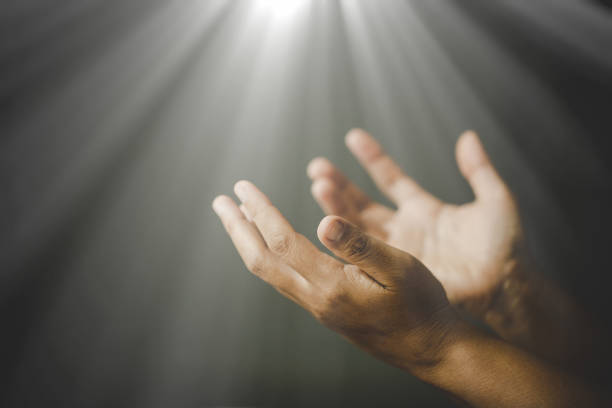 istock woman hands praying to god 1405392855