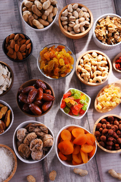 istock Composition with dried fruits and assorted nuts. Delicacies 1405393000