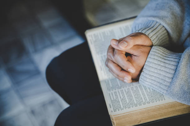 istock Prayer woman hand 1405393090