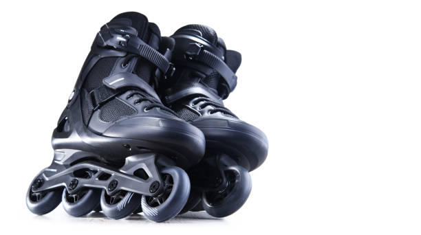istock A pair of black inline skates isolated on white background 1405395522