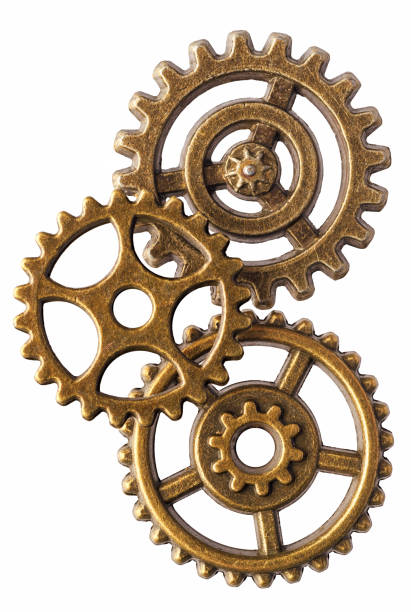 Group of bronze cogwheels stock photo