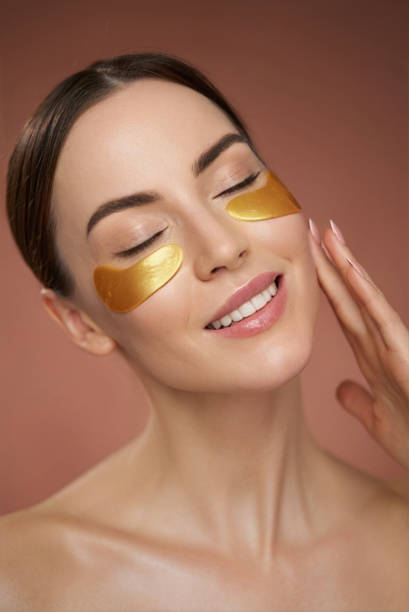 istock Young woman with eye patches 1405398700
